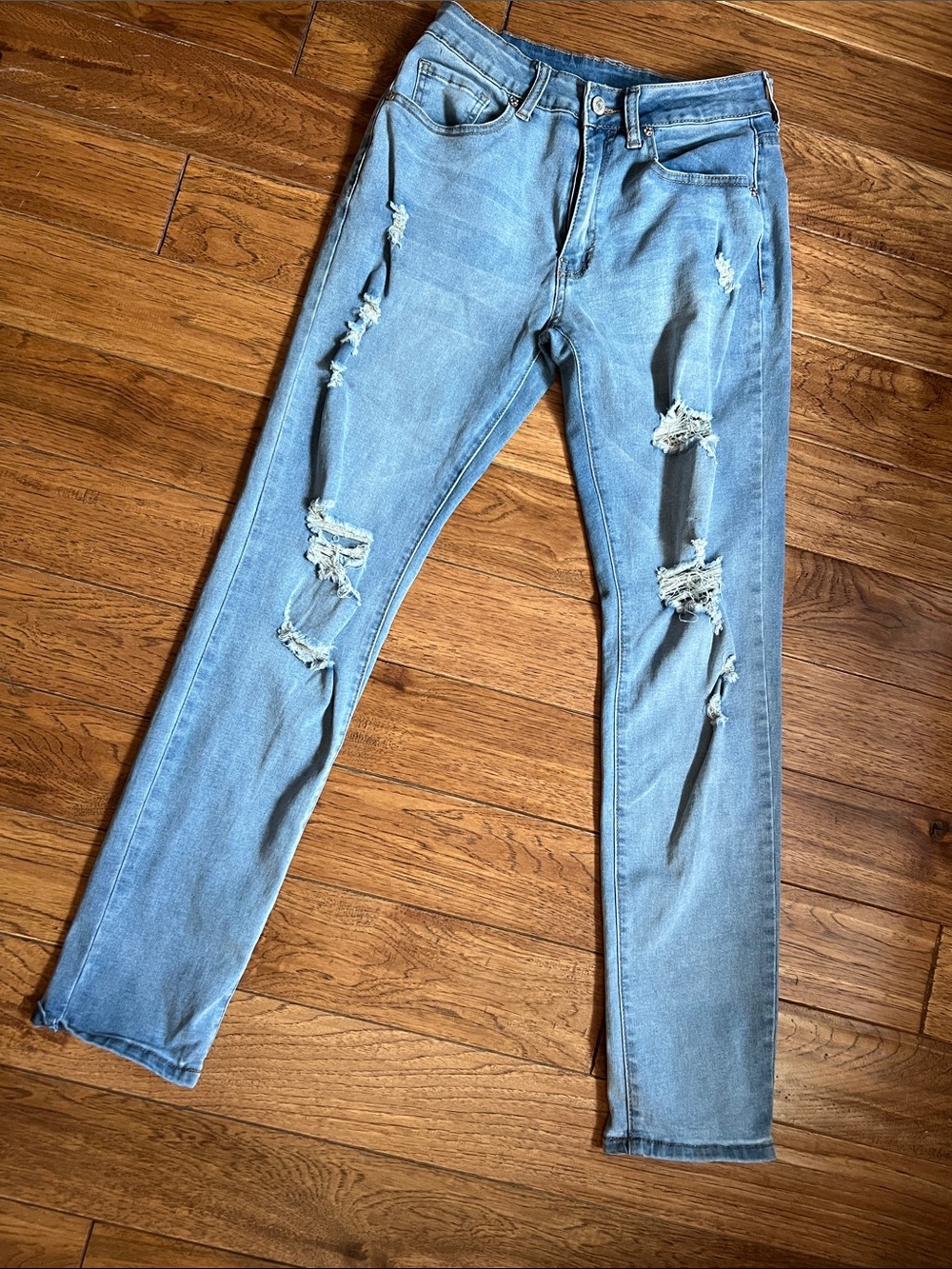 Kunmi WoMen's Light Blue Ripped Slim Jeans